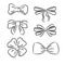 Hand drawn bow ties. Black and white vector sketched icon set.