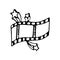Hand drawn film and stars doodle icon. Hand drawn black sketch.