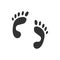 Hand drawn human footprint. Baby foot prin. In doodle style, black silhouette isolated on a white background. Cute element for