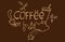 Hand drawn lettering-COFFEE isolated on brown background. decorative wall design. hand drawn vector. glass, bean, leaf an a cup of