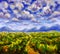 Hand drawn oil painting. Large fluffy clouds over mountains and green field. Abstract art background. Oil painting on canvas