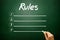 Hand drawn RULES blank list concept on blackboard