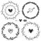 Hand drawn rustic vintage wreaths with hearts. Floral vector