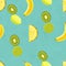 Hand drawn seamless pattern with bananas pineapple slice lemon and kiwi fruit.