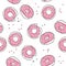 Hand drawn seamless pattern with pink donut with sprinkles isolated on white background