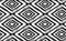 Hand drawn seamless tribal pattern in black and cream. Modern textile, wall art, wrapping paper, wallpaper design.