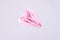 Hand drawn shape of the heart. Sample of pink lip gloss on a white background