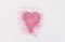 Hand drawn shape of the heart. Sample of pink lip gloss on a white background