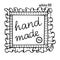 Hand drawn textile patch with seam, button and handwritten inscription `hand made`.