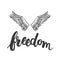 Hand drawn typography lettering phrase Freedom with birds wings on the white background.