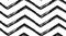 Hand drawn vector abstract rough geometric monochrome seamless zig zag chevron pattern in black and white colors.Hand