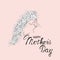 Hand drawn vector silhouette of Woman face, hair with flowers, baby in line art. Mother holding her newborn baby and looking at