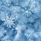 Hand drawn watercolor seamless pattern with snowflakes in blue colors