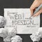 Hand drawn web design diagram on crumpled paper