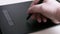 The hand draws and draws on the graphics tablet with a special pen or stylus