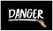 Hand draws the word `DANGER`