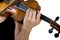 Hand of a female violinist on the fingerboard of a violin  on white