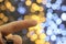 Hand finger pointing to something on blurred bokeh glowing cityscape background