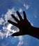 Hand Five Image With Cloud and Blue Sky Background