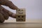 Hand flipping change emotions from sad to happy which print screen on wooden cubic. Customer experience survey and satisfaction