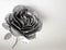 Hand forged rose. Rose handmade forged from metal on a white back