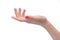 Hand gesture. Close-up of female hand gesturing while isolated o