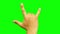 Hand gesturing heavy metal rock sign isolated