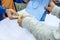 Hand giving money and take paper bag from staff cashier in store