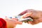Hand giving stack of money isolated, hard worked hand taking euro money. Currency transfer on white background. Reward for hard