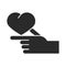 Hand with heart help charity donation and love silhouette icon