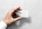 Hand hold blank translucent card mockup with rounded corners