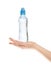 Hand hold bottle of drinking water o