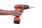 Hand hold cordless electric driver on white background