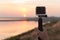 Hand hold extreme camera take photo during sunset