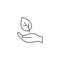 Hand hold plant leaf line icon. Hand linear leaf earth care growth nature icon