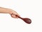 Hand hold wood spoon isolated