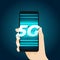 Hand holding 5G smartphone. Fifth generation wireless network.