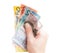 Hand holding Australian bank notes