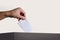 Hand holding ballot paper for election vote at place election background. Election vote concept