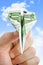 Hand Holding Banknote Paper Plane in making money and financial