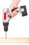 Hand holding battery drill