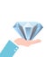 Hand holding big diamond concept of rich brilliant in business