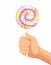 Hand holding big lollipop sweet candy in cartoon realistic illustration vector isolated in white background