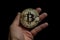 Hand Holding Bitcoin