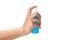 Hand holding blue color spay bottle