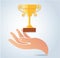 Hand holding champion cup vector, victory logo concept