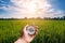 Hand holding compass and rice field sunset