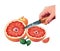 Hand holding freshly sliced grapefruit for healthy eating