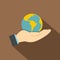 Hand holding globe icon, flat style