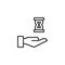 Hand holding Hourglass outline icon